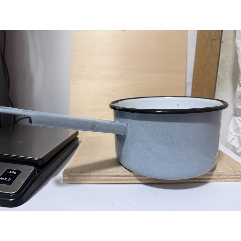 vintage light blue enamelware saucepan